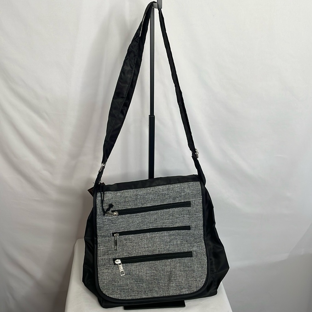 Gold Coast woven black rfid crossbody bag‎ multiple pockets front